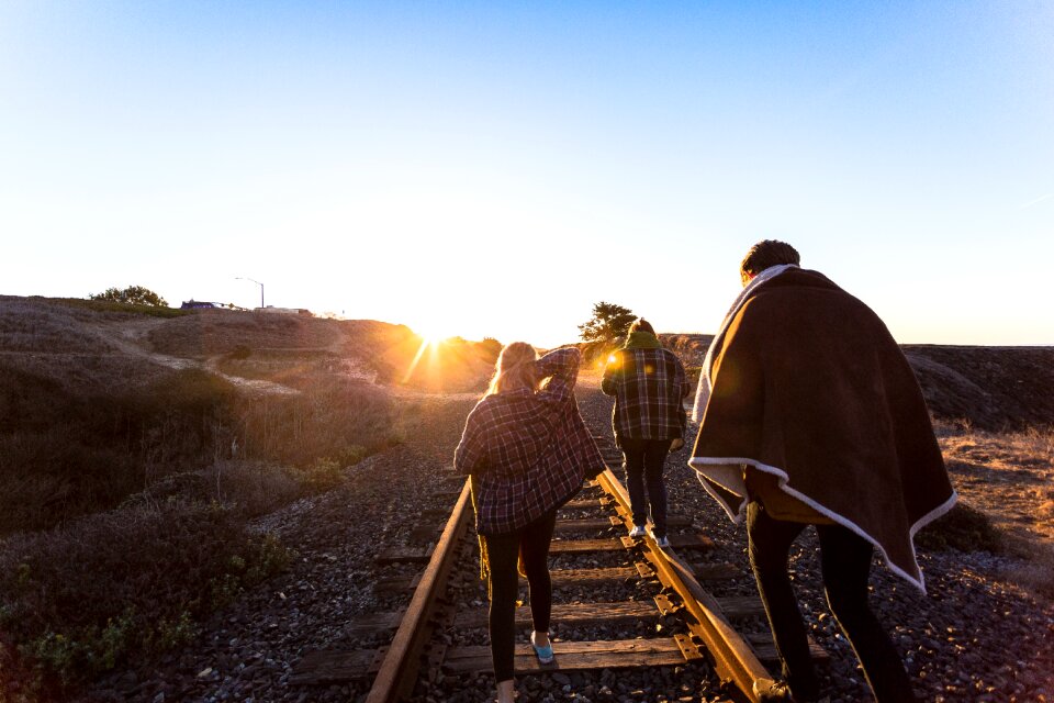 Rail tracks walking sunlight photo