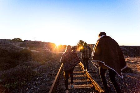 Rail tracks walking sunlight photo