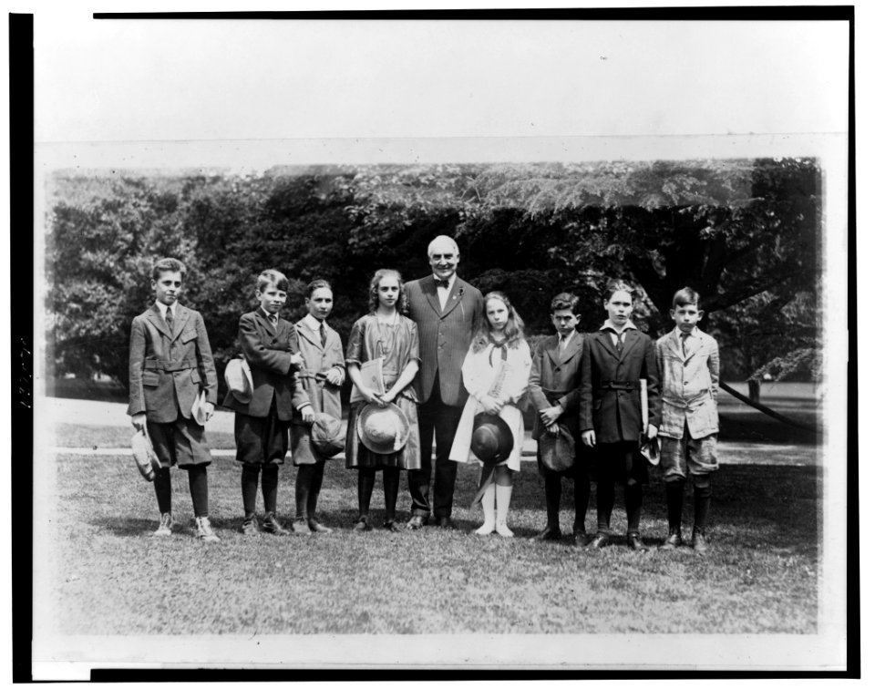 With members of the nature study class of John Buroughs (sic) School whom he invited to the White House to see an owls nest in the grounds LCCN2002713189
