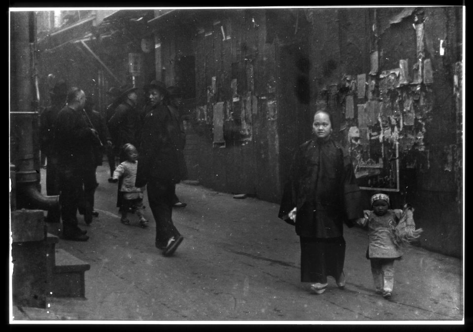 Woman and a child walking down a street, Chinatown, San Francisco LOC agc.7a55069