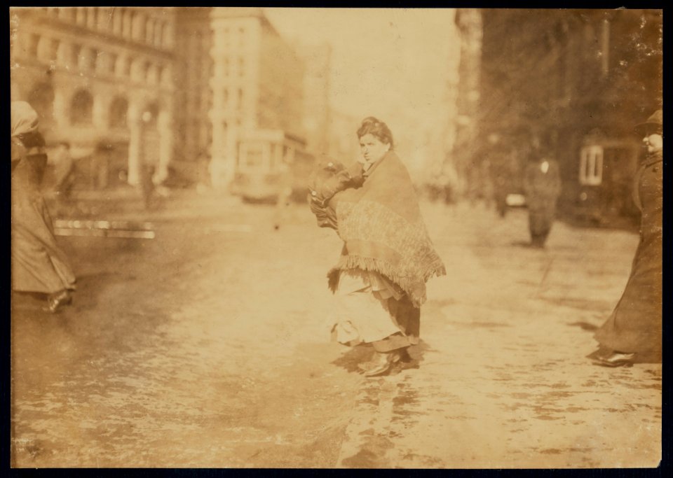 Woman crossing Astor Place with home-work. LOC nclc.04169