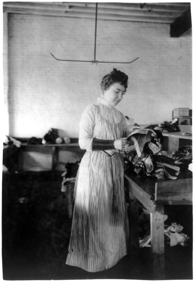 Woman distributing work in a shoe factory, Lynn, Mass. LCCN2006681291
