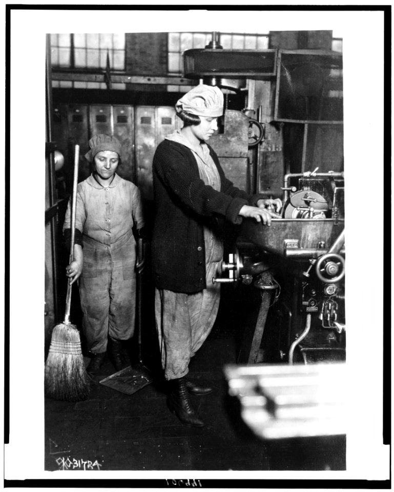Woman grinding small gear cutter, and woman sweeping at Midvale Steel & Ordnance Co., Nicetown, Pa., during World War I LCCN92522617