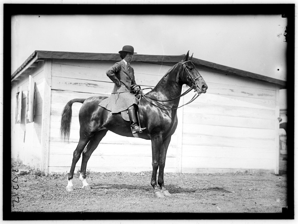 Woman on horse LOC hec.04841