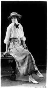 Woman modeling skirt, blouse, hat and shoes LCCN2003678053