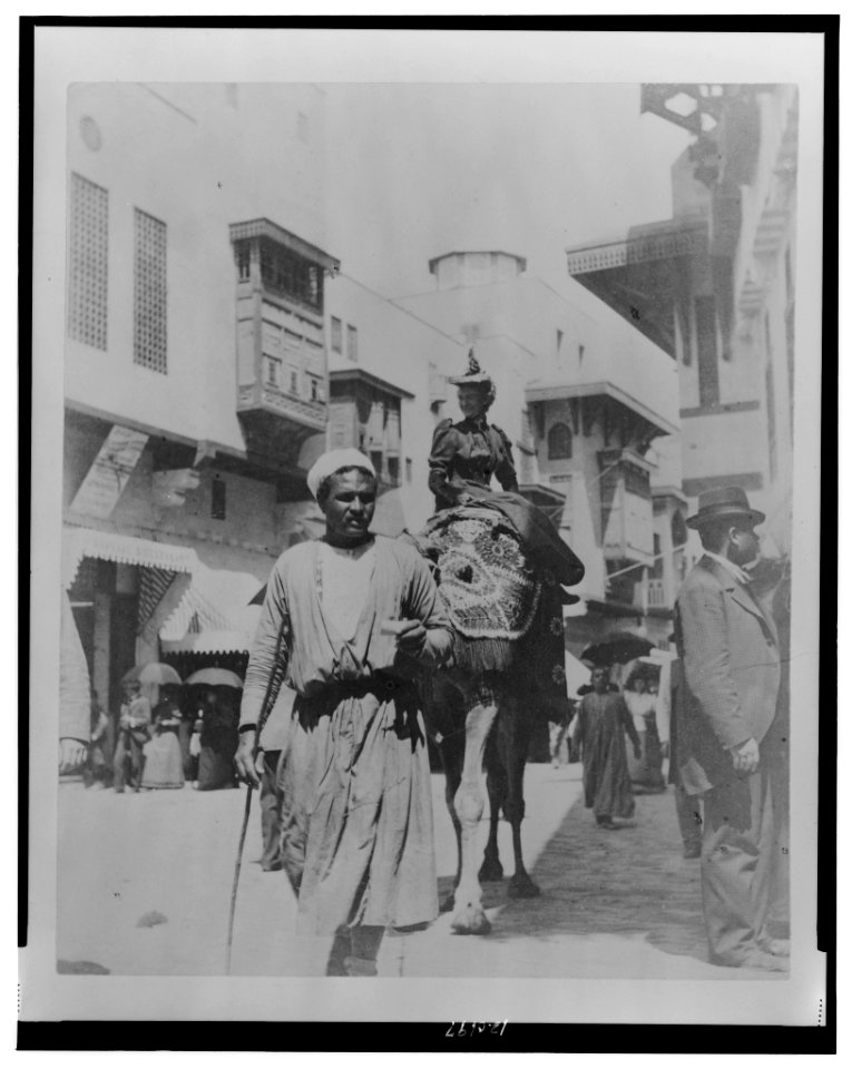 Woman riding on back of camel, at the World's Columbian Exposition, Chicago, Illinois LCCN98503299