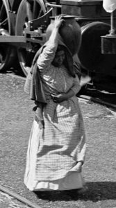 Woman carrying pottery jar between 1880 and 1897, Mexican Central Railway train (cropped) photo
