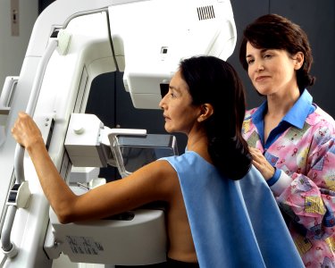 Woman receives mammogram (1) photo