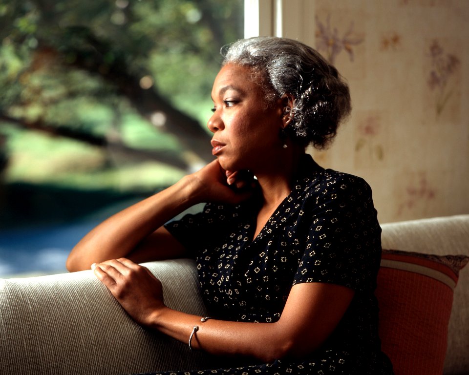 Woman staring out window (2)