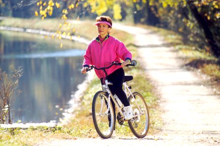 Woman riding a bike photo