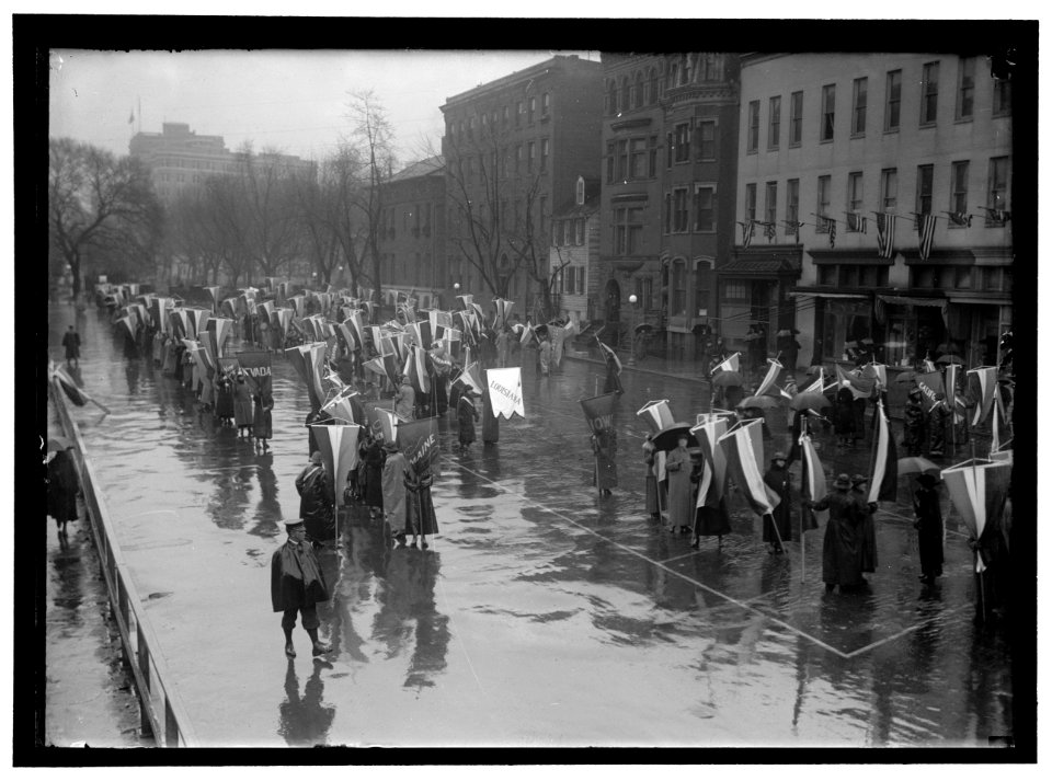 WOMAN SUFFRAGE. MARCHING IN RAIN LCCN2016867281