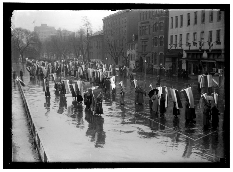 WOMAN SUFFRAGE. MARCHING IN RAIN LCCN2016867271