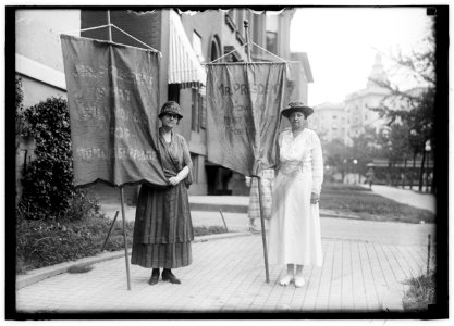 WOMAN SUFFRAGE. SUFFRAGETTES WITH BANNERS LCCN2016869478