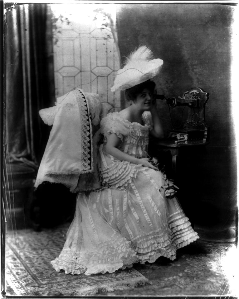 Woman using early home telephone LCCN2013647218
