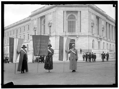 WOMAN SUFFRAGE. PICKETING AT SENATE OFFICE BUILDING- MILDRED GILBERT OF CALIFORNIA; PAULINE FLOYD OF D.C.; VIVIAN PIERCE, CALIFORNIA LCCN2016866203