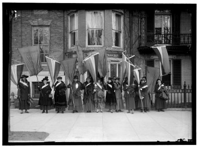 WOMAN SUFFRAGE. LEAVING HEADQUARTERS WITH BANNERS LCCN2016867111 photo
