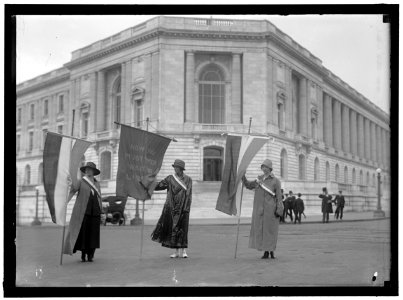 WOMAN SUFFRAGE. PICKETING AT SENATE OFFICE BUILDING- MILDRED GILBERT OF CALIFORNIA; PAULINE FLOYD OF D.C.; VIVIAN PIERCE, CALIFORNIA LCCN2016866201