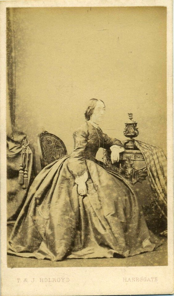 Woman with urn by T & J Holroyd
