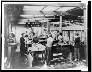 Women immersing bouchon assemblies for hand grenades in Vatudrip to prevent rust, Gorham Manufacturing Co., Providence, Rhode Island, during World War I LCCN96510723 photo
