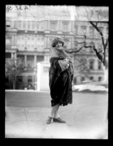 Woman; State, War and Navy Building in background. Washington, D.C. LCCN2016891059