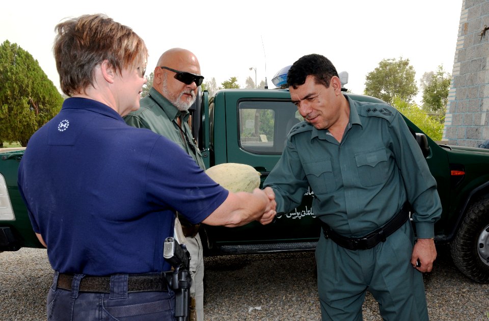 Women from 203rd Zone Afghan Border Police and TAAC-S attend shura at Kandahar Airfield, Afghanistan 150809-N-SQ656-211