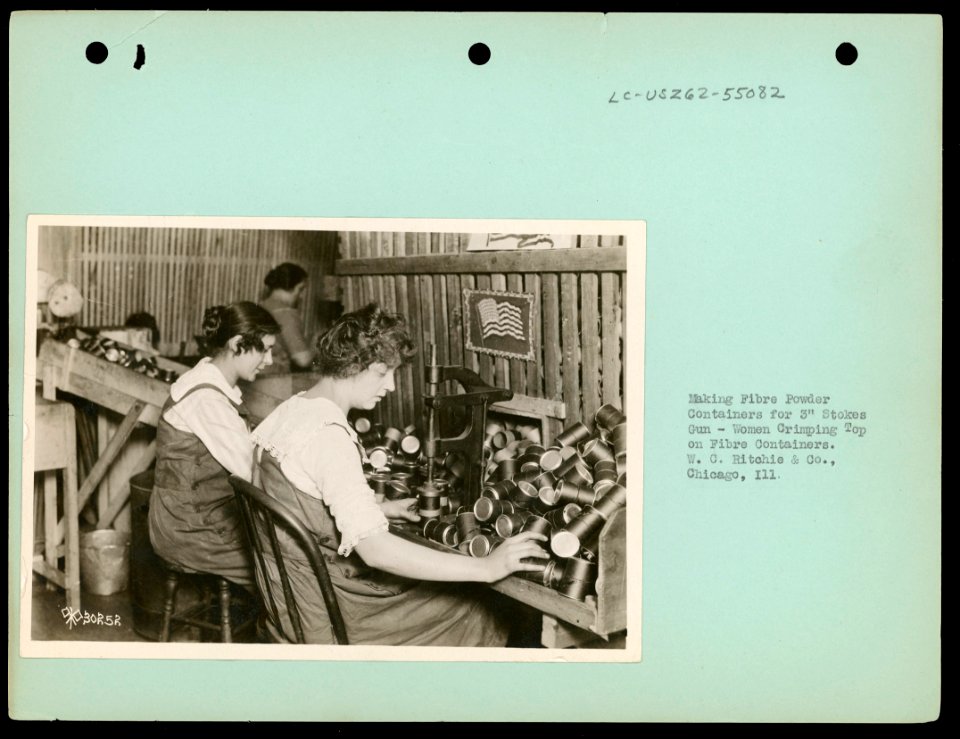 Women working in ordnance plants in World War I- making fibre powder containers for 3 Stokes gun - women crimping top on fibre containers at W.C. Ritchie & Co., Chicago, Ill. LCCN2004673217