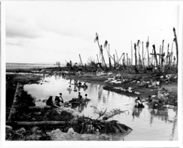 Women washing clothes in a river near Hagåtña on 12 August 1944 photo