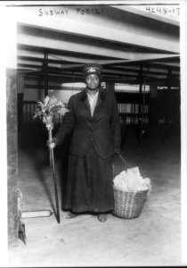 Women subway workers, N.Y.C., 1917- African American porter posed with cleaning gear LCCN2007678623