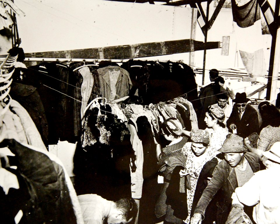 Women crowd the dress market, Mejez-El-Bab, Tunisia, 1943 (35100426240)