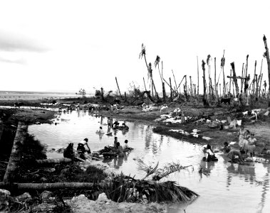 Women washing clothes in a river near Hagåtña on 12 August 1944 photo