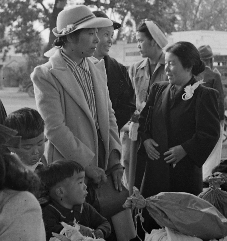Woodland, California. Families of Japanese ancestry with their baggage at railroad station awaiting . . . - NARA - 537803 (cropped)