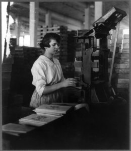 Wooden Box Industry- young woman working at machine LCCN2005696174