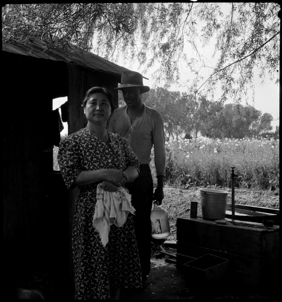 Woodland, California. This mother of Japanese ancestry is ready with her family of ten, to leave th . . . - NARA - 537762