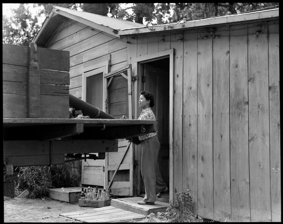Woodland, California. Scene on farm being evacuated by people of Japanese ancestry. The mother is . . . - NARA - 537767