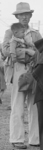 Woodland, California. Departure of evacuees of Japanese ancestry by special train for Merced Assemb . . . - NARA - 537816 (cropped) photo