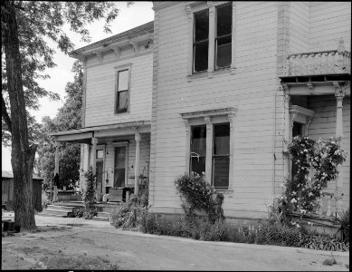 Woodland, California. This house, a mansion of the 1890's, was evacuated on May 19, 1942, by a farm . . . - NARA - 537620 photo
