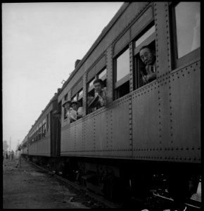 Woodland, California. Evacuees of Japanese ancestry from this rich agricultural district are on the . . . - NARA - 537820 photo