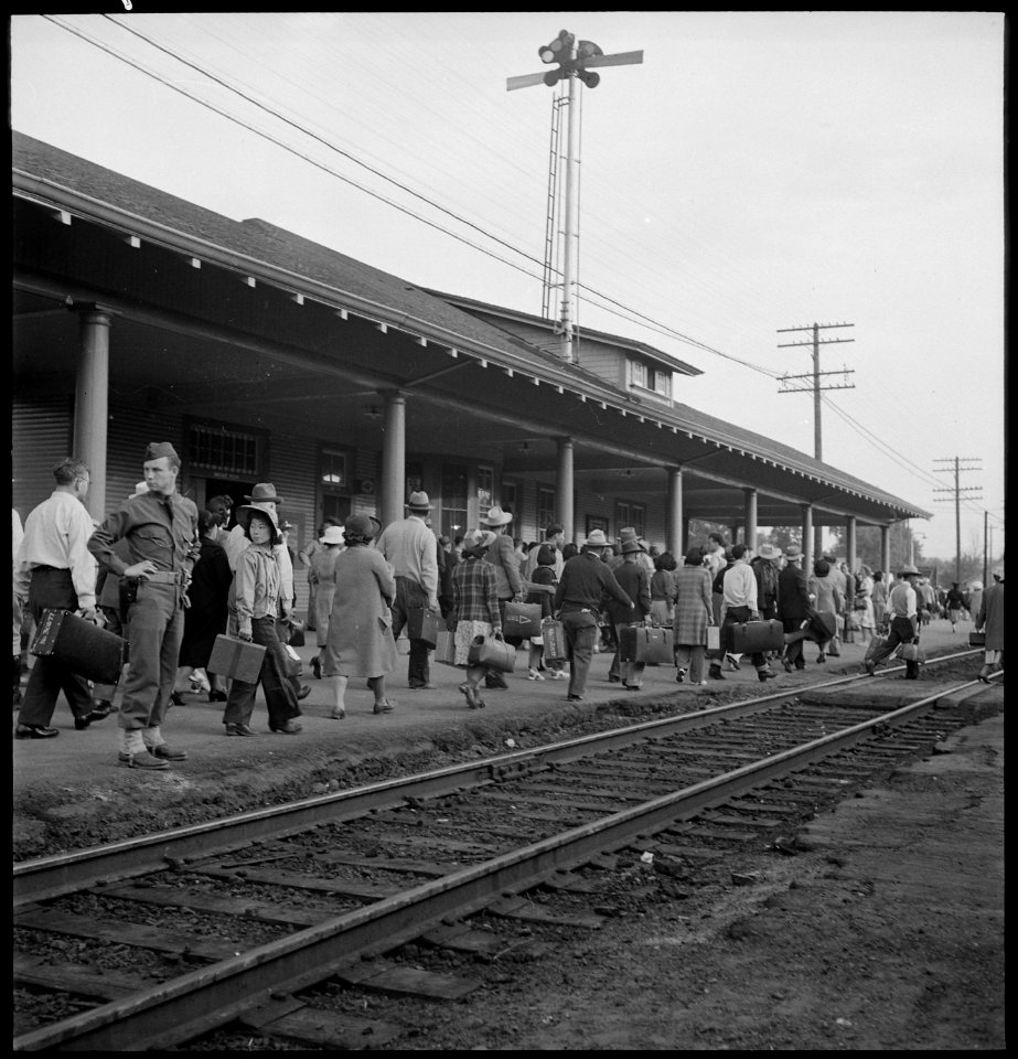 Woodland, Yolo County, California. Farm family of Japanese ancestry see the train approaching down . . . - NARA - 537808