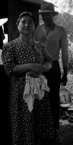 Woodland, California. This mother of Japanese ancestry is ready with her family of ten, to leave th . . . - NARA - 537762 (cropped) photo