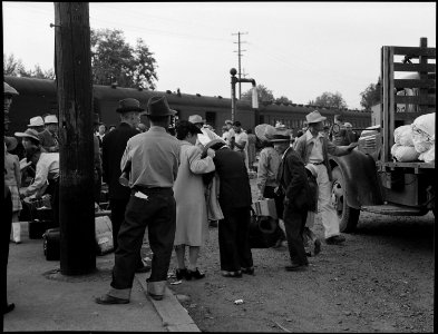 Woodland, California. Women at railroad station on morning of departure of persons of Japanese 21-1221M photo