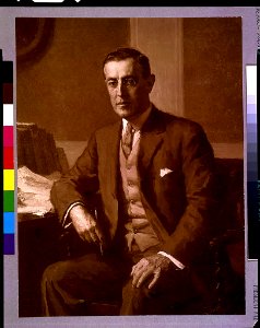 Woodrow Wilson, three-quarter length portrait, seated, facing slightly left LCCN93500966 photo