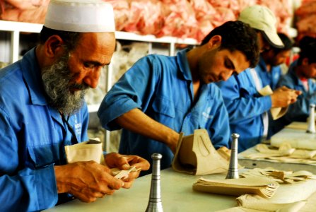 Workers at the Kabul Melli factory handcraft combat boots (4919574464)