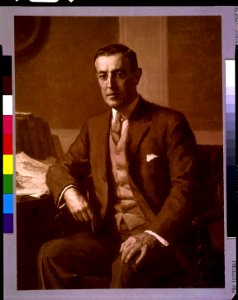 Woodrow Wilson, three-quarter length portrait, seated, facing slightly left LCCN93500966
