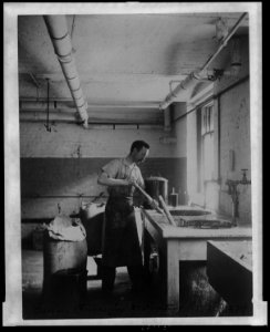 Worker prepares gum for postage stamps in the Stamp Division at the Bureau of Engraving & Printing LCCN2006692522