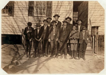 Workers in Bibb Mill -1, Macon, Ga. Boy on right on right hand end, Burdick Collins, 2 years in mill work. Next, Scoven Preston, 1 year in mill work. Next, Charlie Benson, 4 years in mill LOC nclc.01592