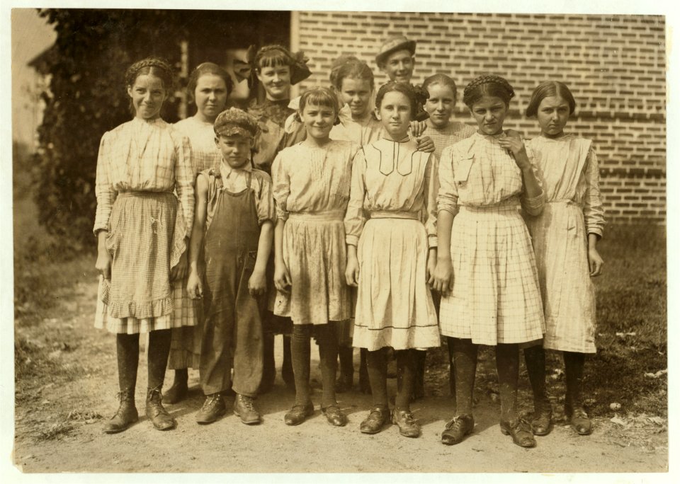 Workers in the Nokomis Cotton Mill, Lexington, N.C. The smallest boy said he was 11 years old and makes 50 cents a day. Been doffing there for some months. The Band Boy who seems much LOC nclc.02643