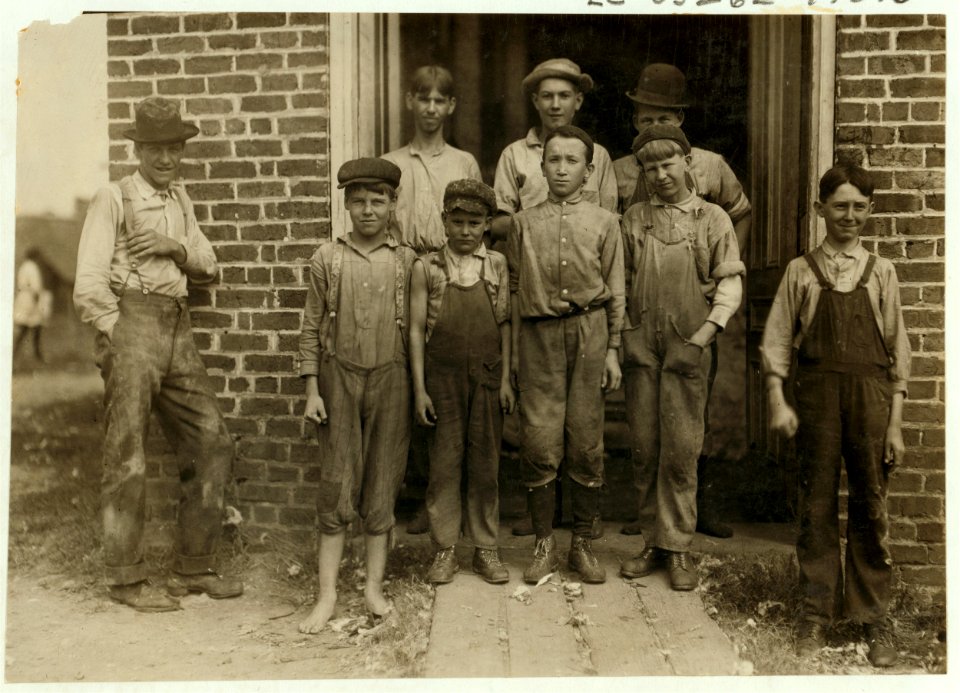Workers in the Nokomis Cotton Mill, Lexington, N.C. The smallest boy said he was 11 years old and makes 50 cents a day. Been doffing there for some months. The Band Boy who seems much LOC cph.3a47666