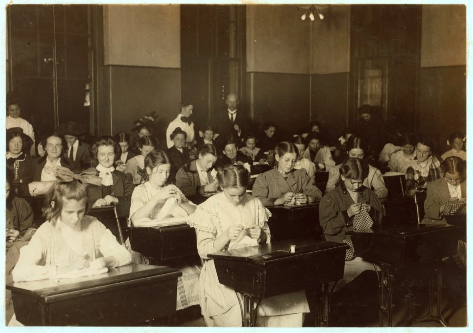 Working Girls Learning Dressmaking in the Free Evening School. Boston 1915 Exhibit. LOC cph.3b11482