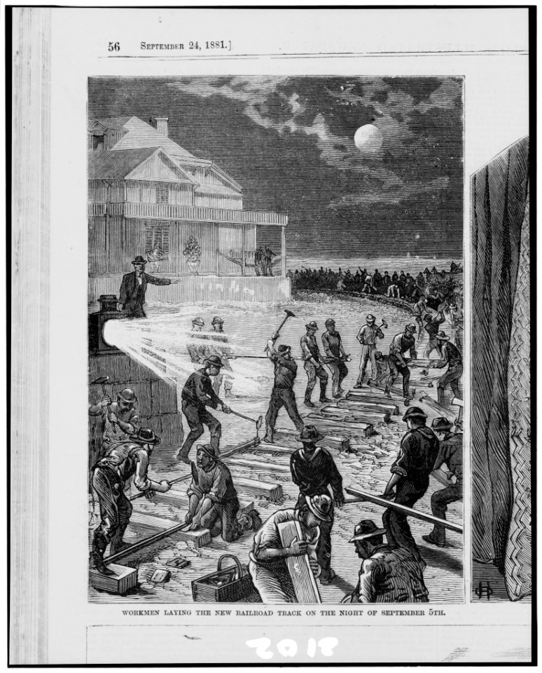 Workmen laying the new railroad track on the night of September 5th - from sketches by a staff artist. LCCN95509679
