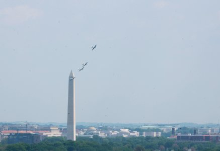 World War II era planes fly over Washington, D.C. seen from Arlington National Cemetery (17245463819)